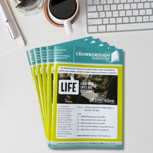 Latest edition of The Crowborough Magazine fanned out on a desk